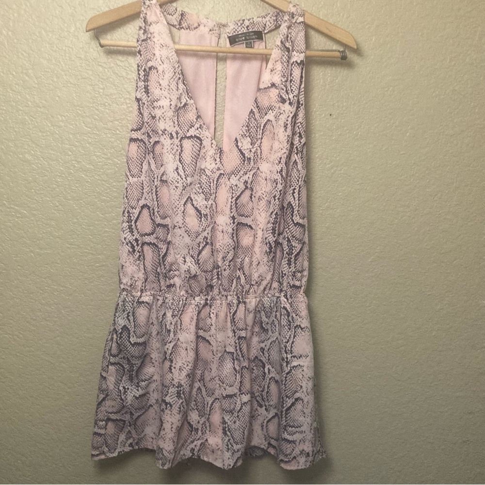 Pink and grey snakeskin print romper with a V-neck and backless design